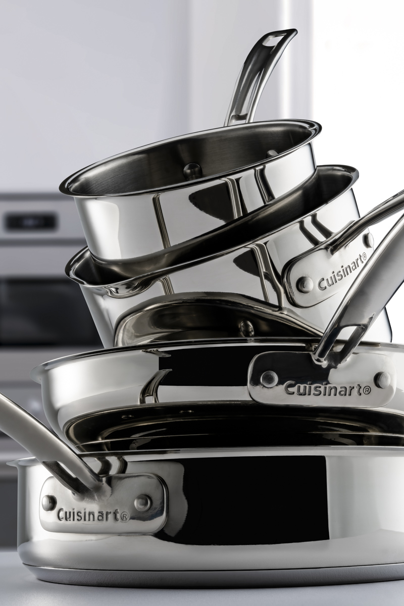 Stainless steel pots and pans photographed on white background for product catalog — commercial product photography by PROSPEKT Product Works